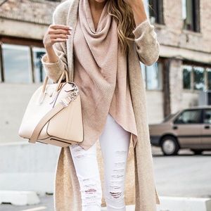 Cali White distressed Torn a bit jeans